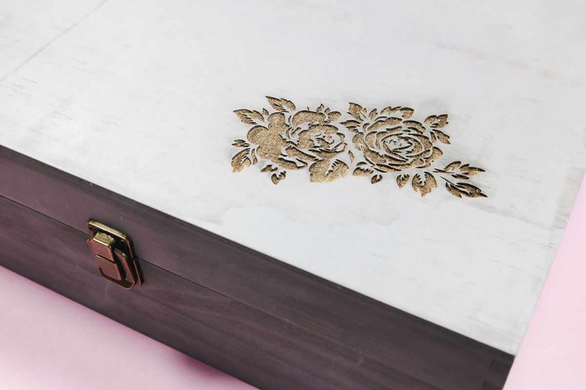 Close up of wooden box engraved by the WeCreat Vision Pro.