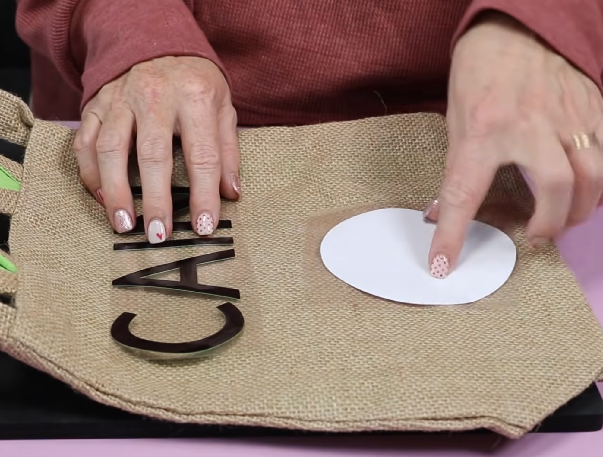 Locate designs on burlap Easter basket.