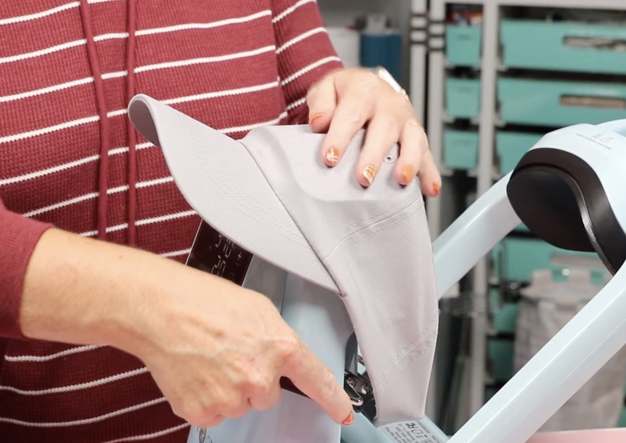 Add hat to HTVRont Auto Hat Press.