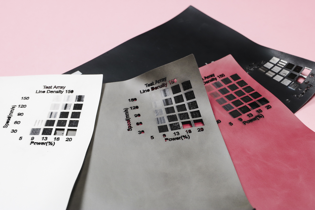 Faux leather laser engraving test array samples.