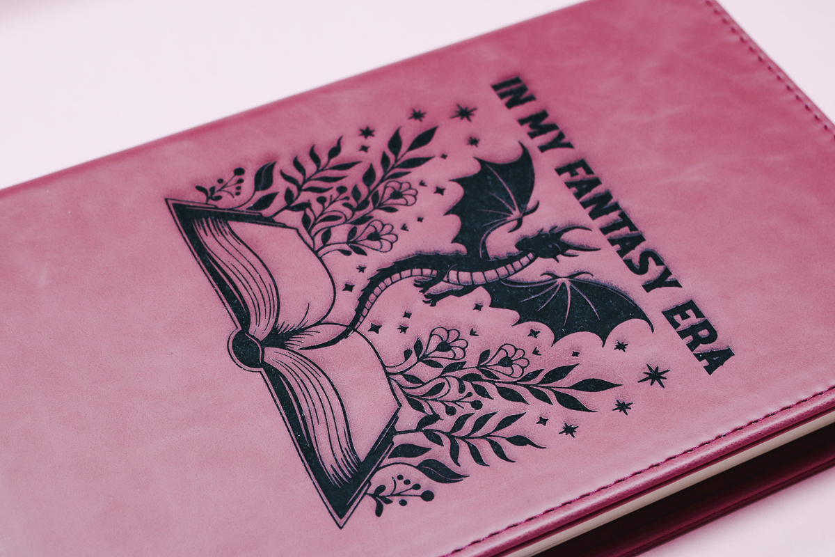 Close up of leather engraved faux leather notebook.