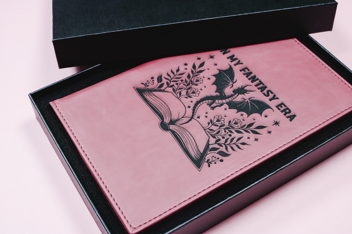 Laser engraved faux leather notebook in box.