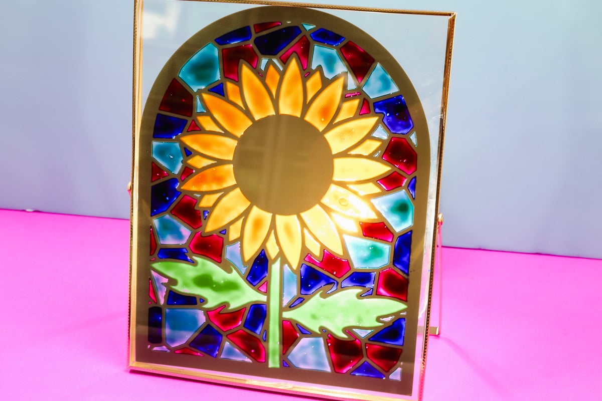 Finished stained glass with Cricut frame.
