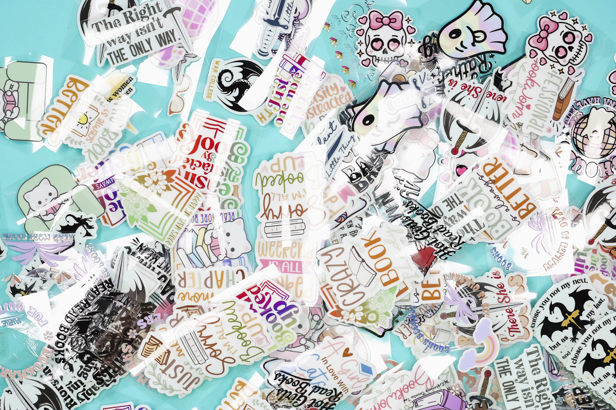 Glass can party stickers on the table.