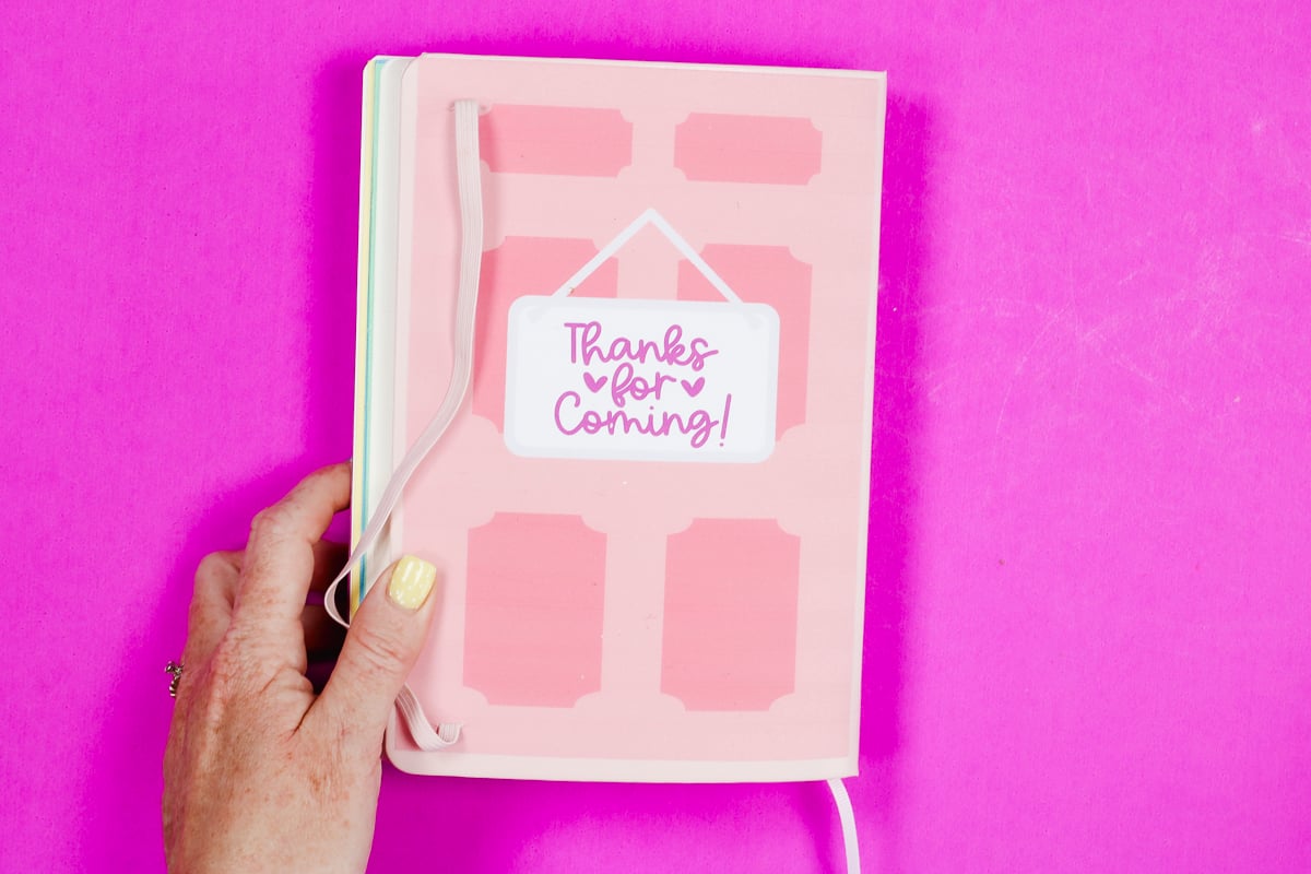 Finish your traveling journal by decorating the back cover.