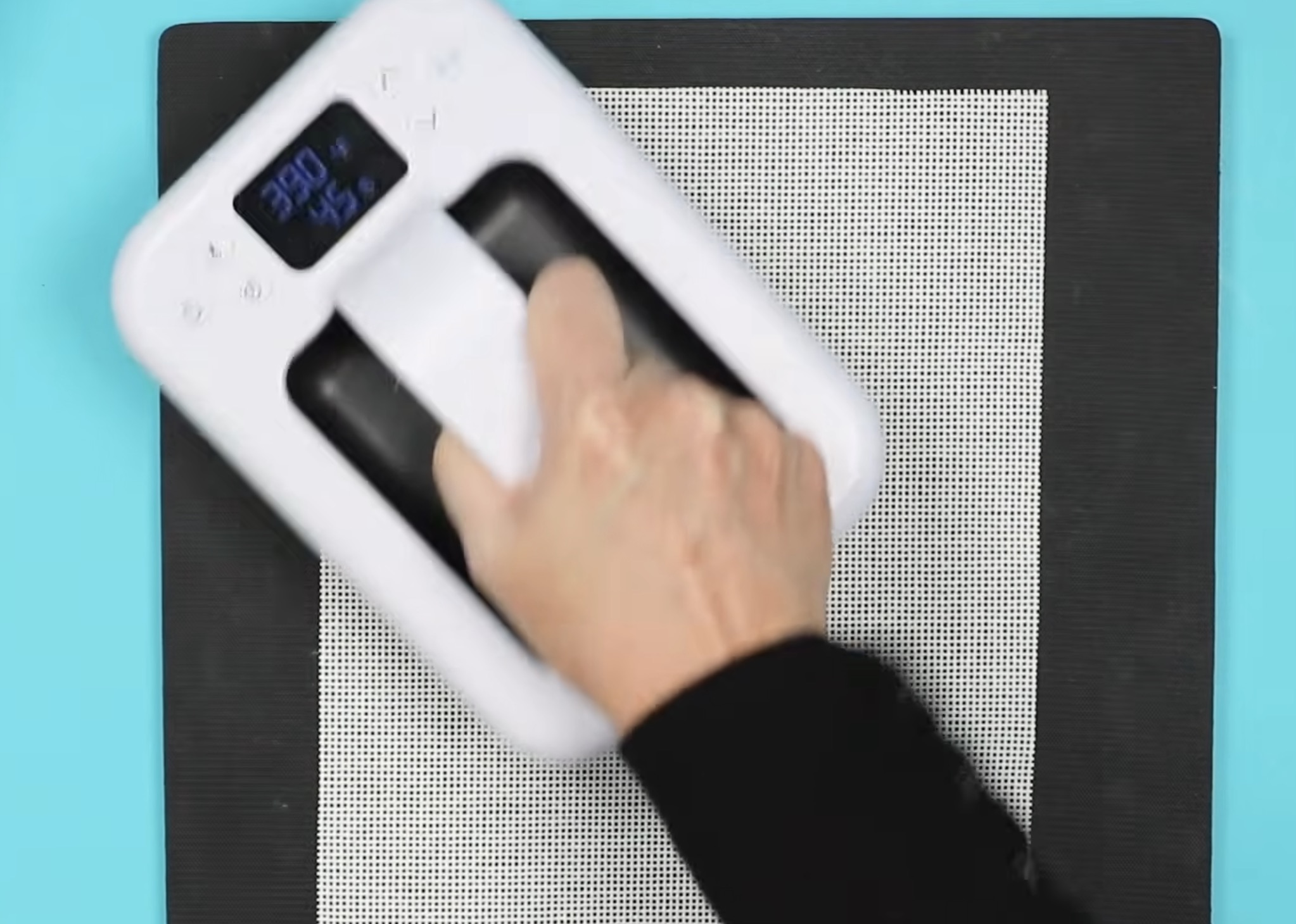 Press the needlepoint canvas to flatten.