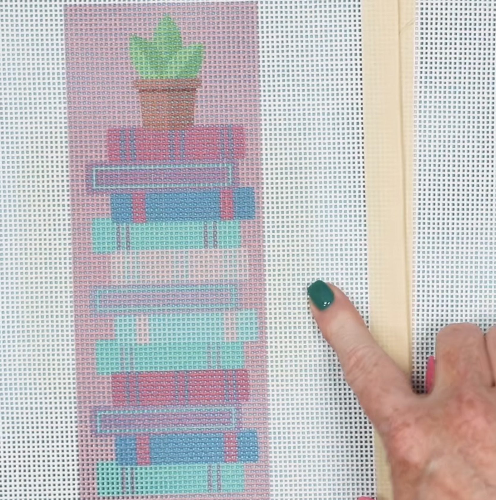 Close up of finished sublimation bookmark needlepoint canvas.