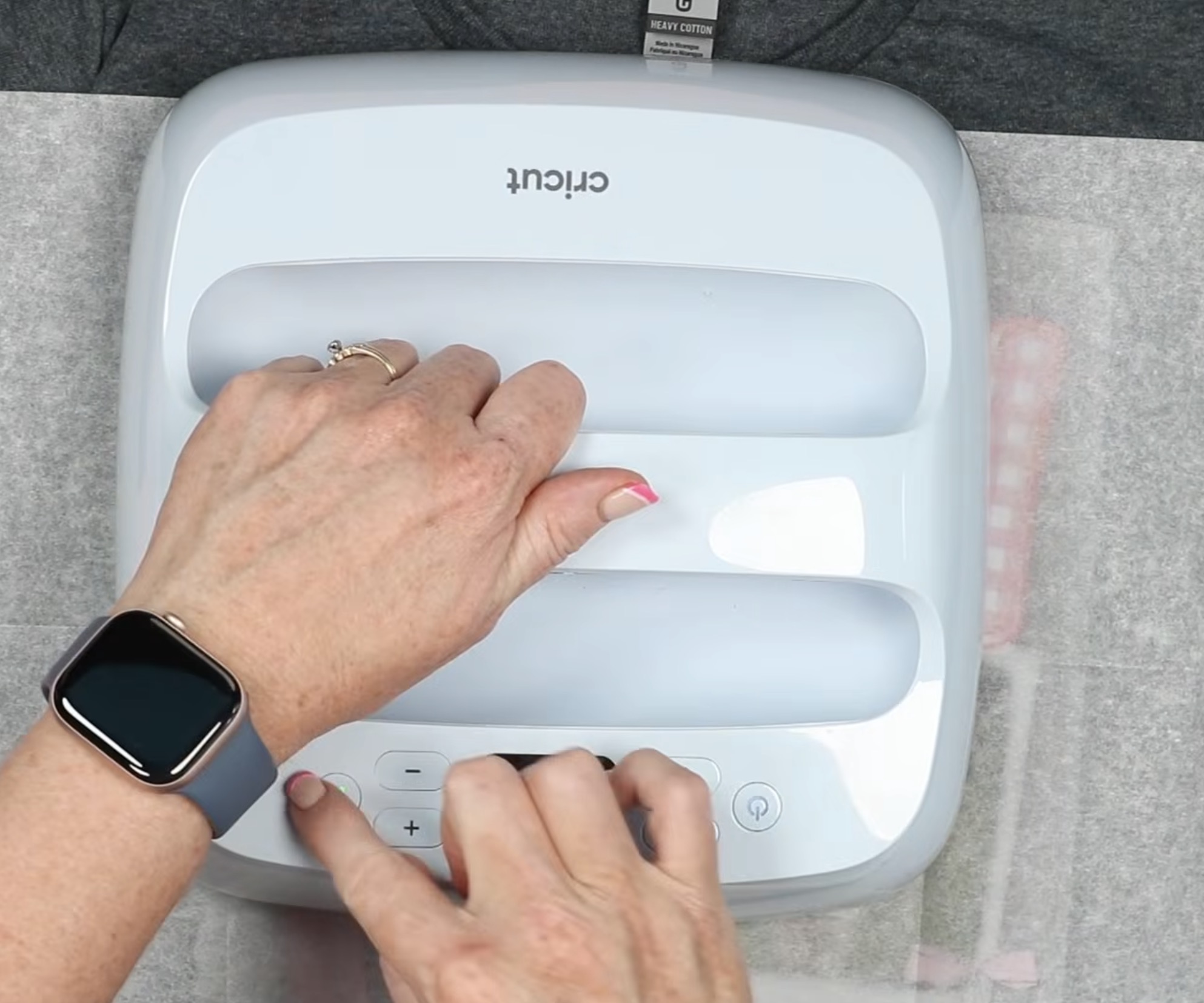 EasyPress on DTF print with protective paper.