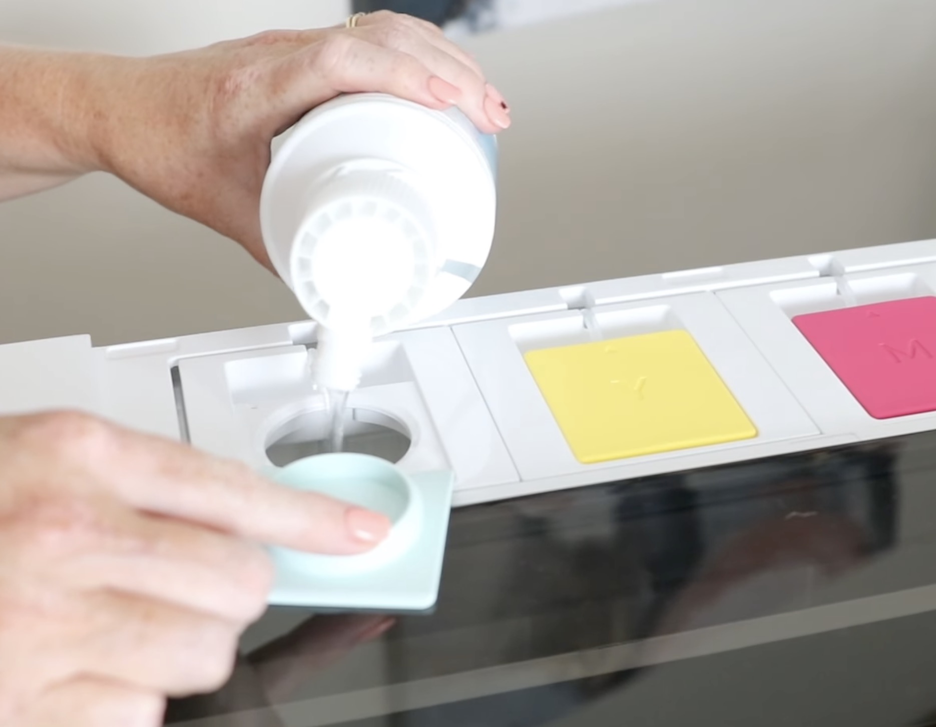 Pour moisturizing fluid into printer.