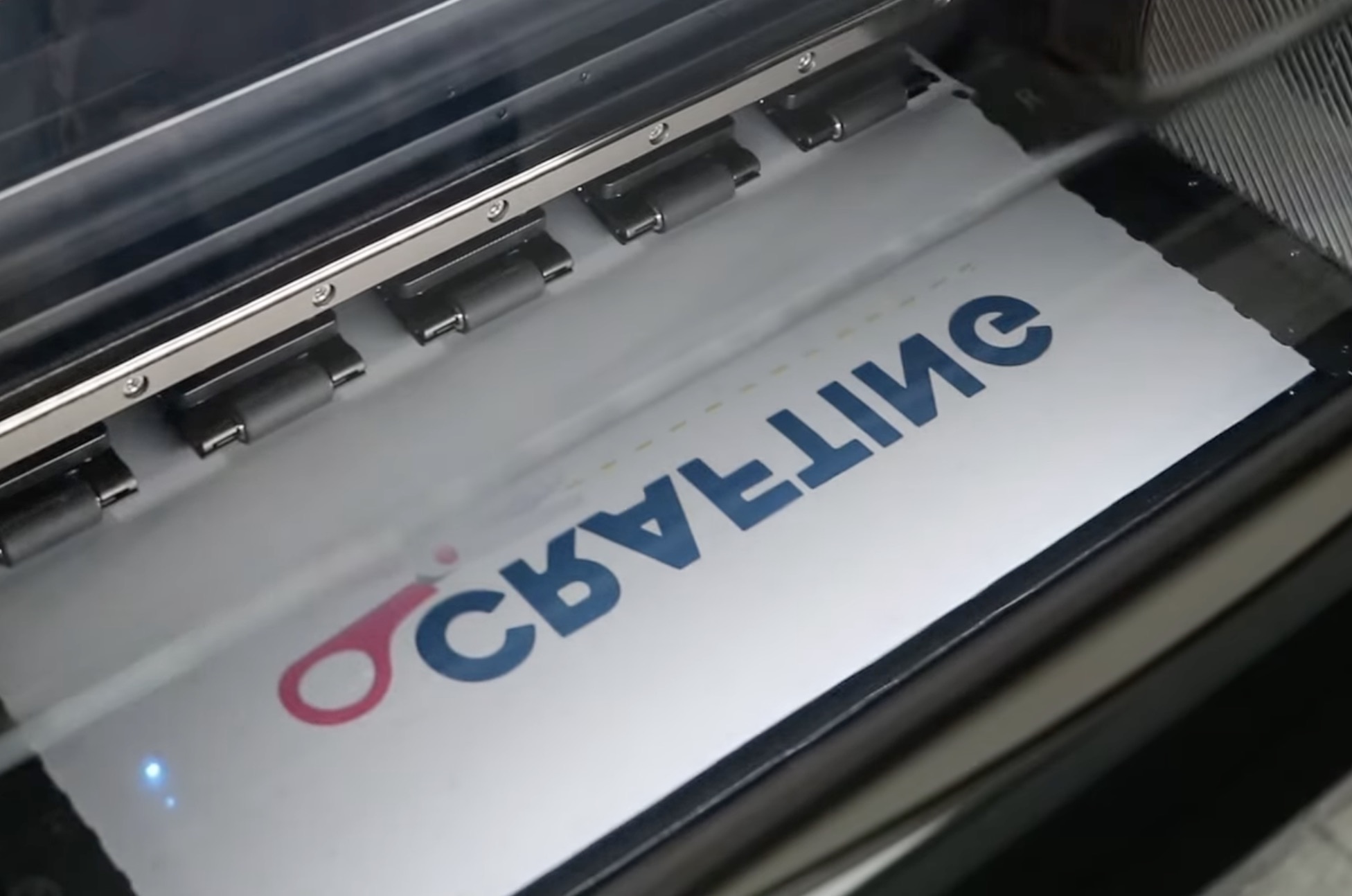 DTF printer printing on film.