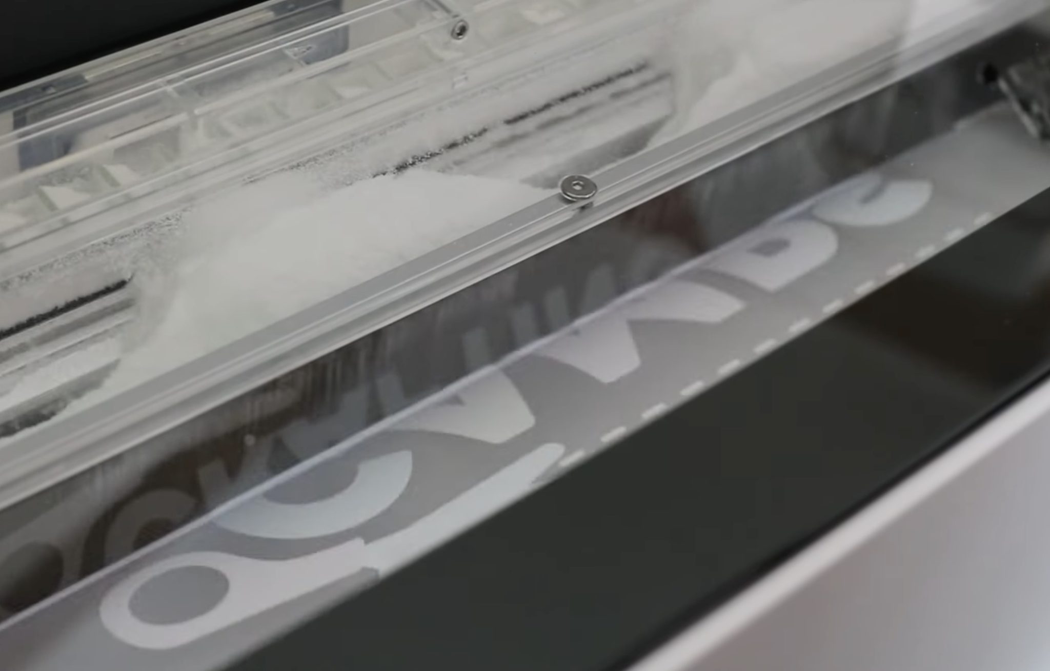 Print moving through the shaker oven.