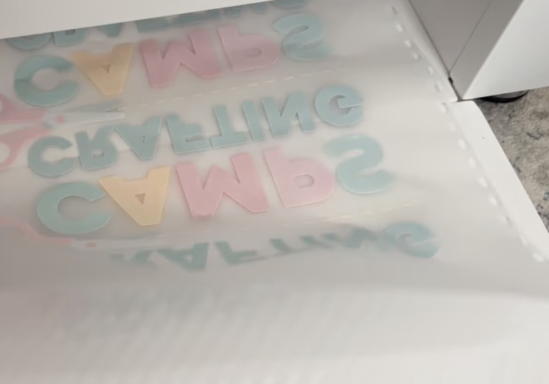 DTF print on bottom tray.