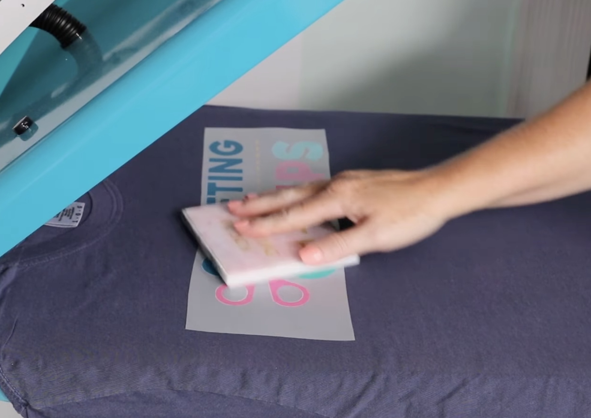 Use DTF cooling block to cool design.