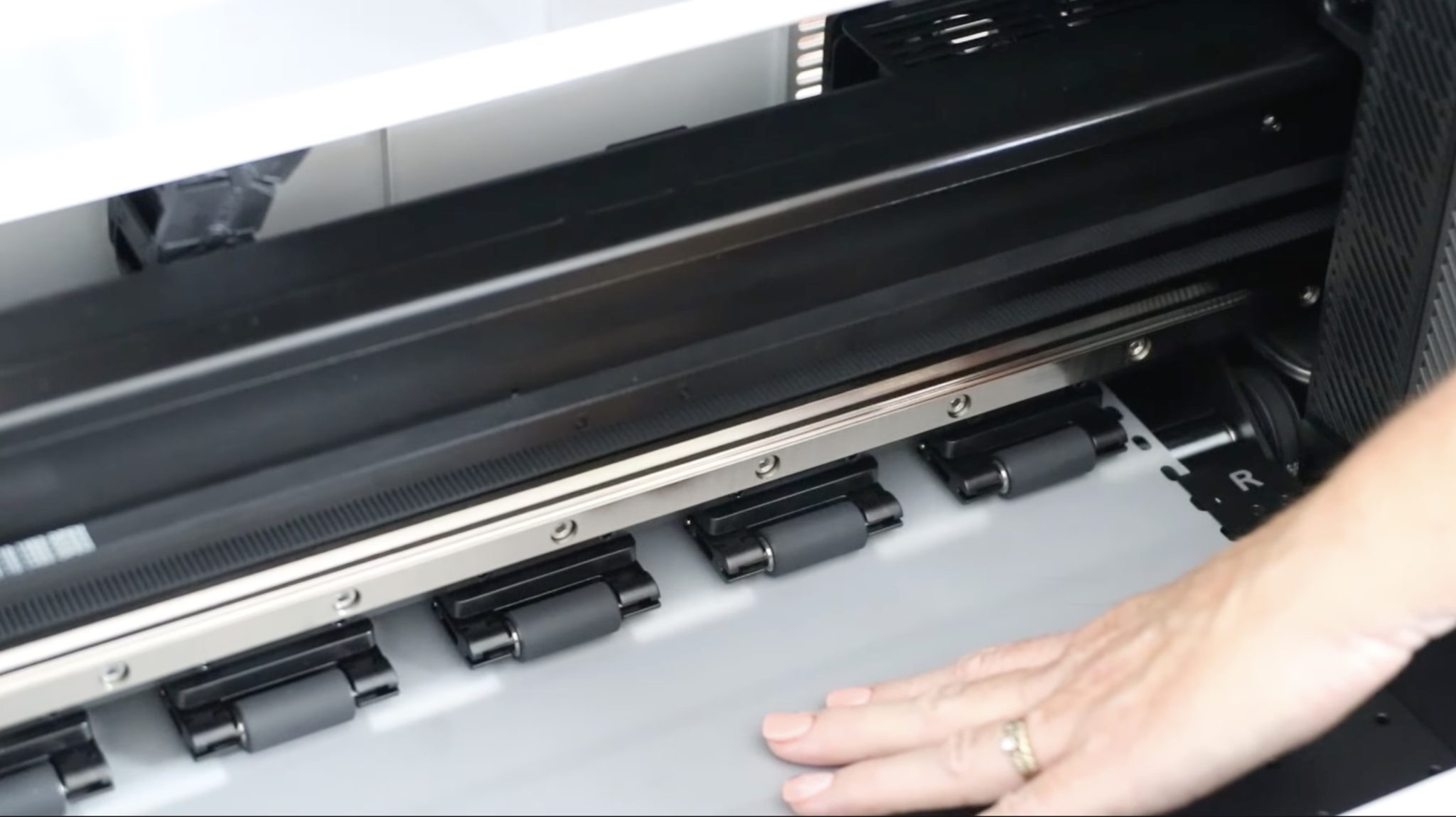 Feed film through printer.