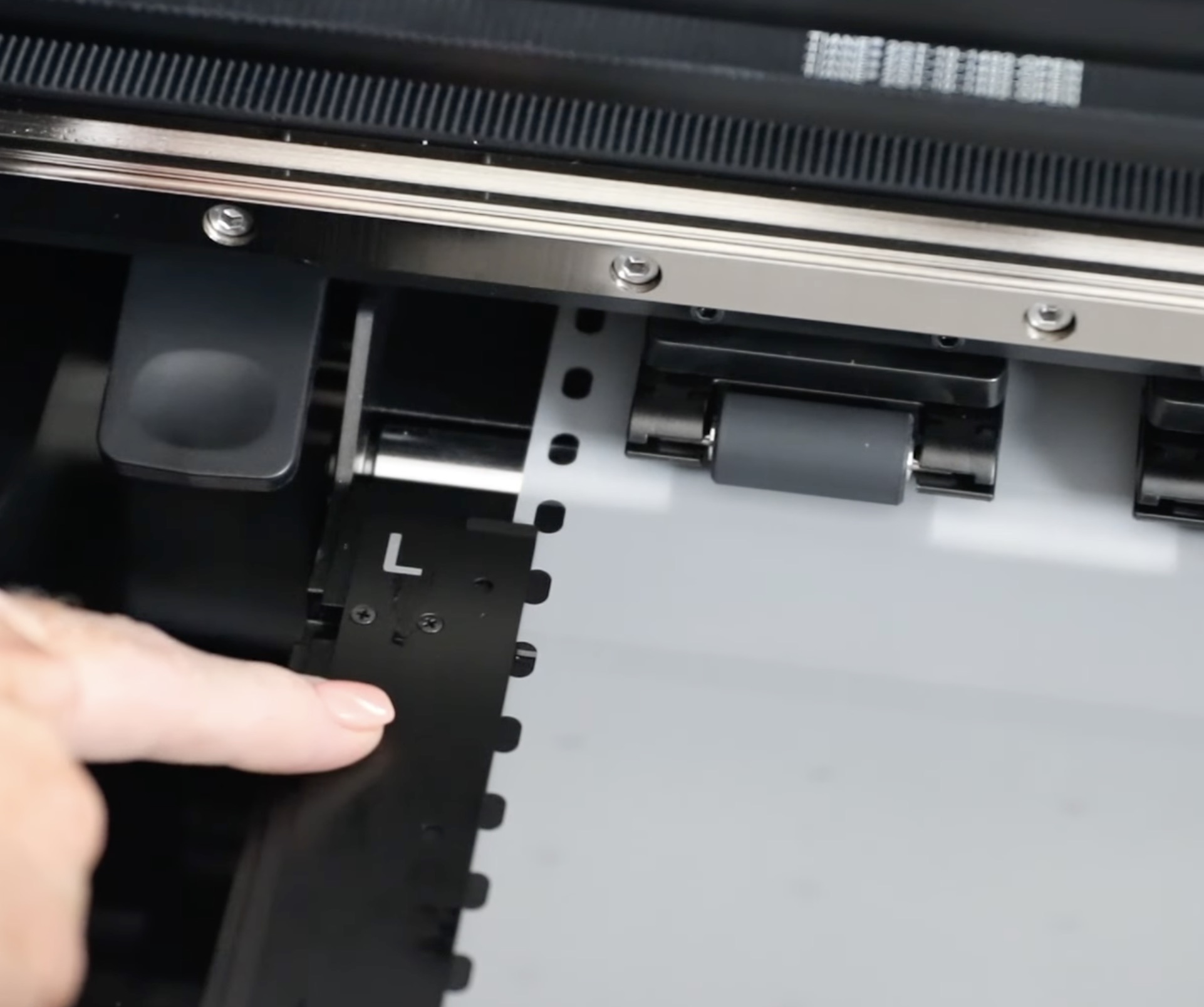 Move bracket to line up with the film.