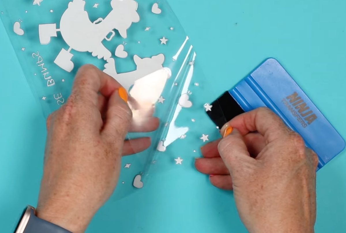 Peel the backing away from the UV DTF.