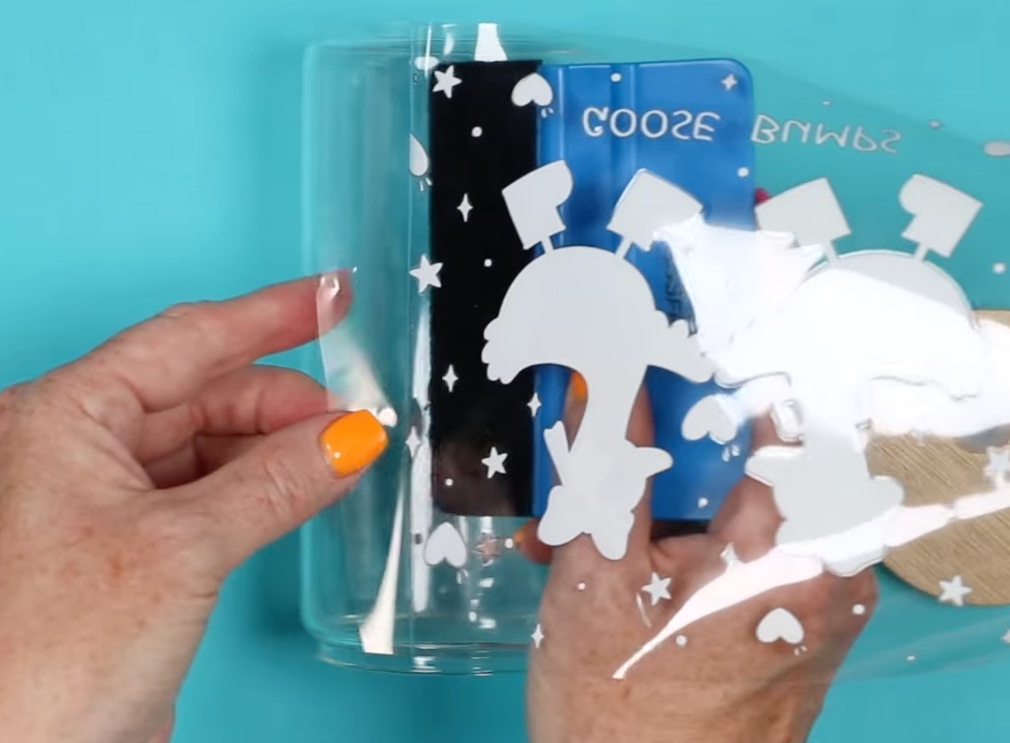 Roll UV DTF print onto glass can.