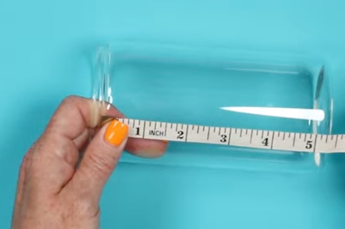 Measure the height of the glass can.