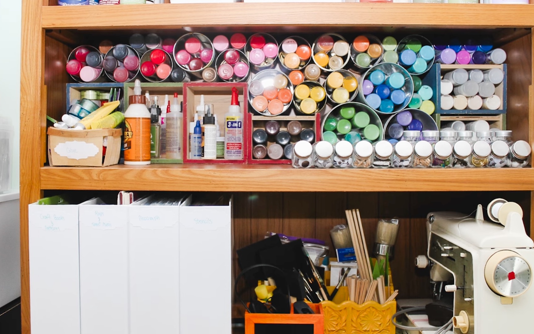 Craft organization on desk hutch.
