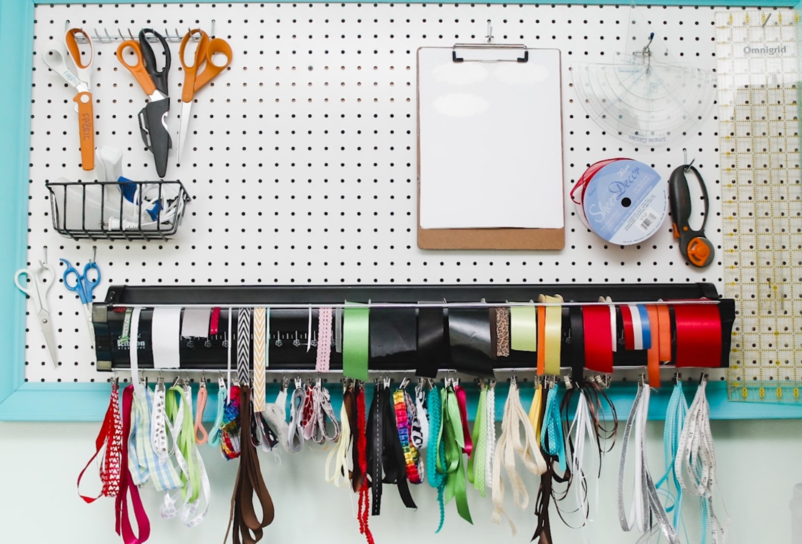Craft room evolution ribbon organization.