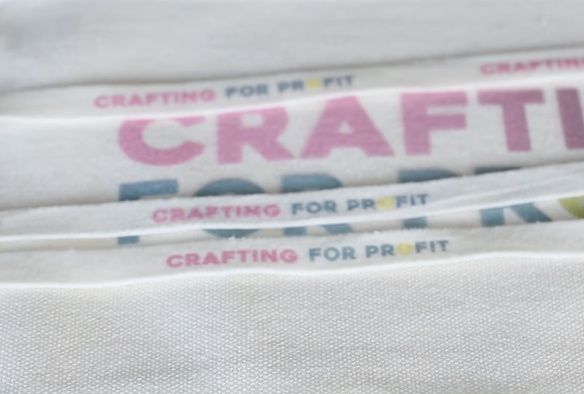 Flexible white ink on flat ribbon.