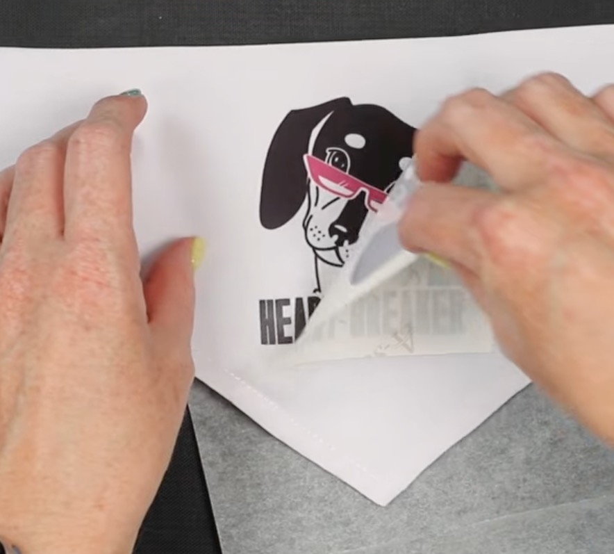 Remove sublimation paper from the bandana.