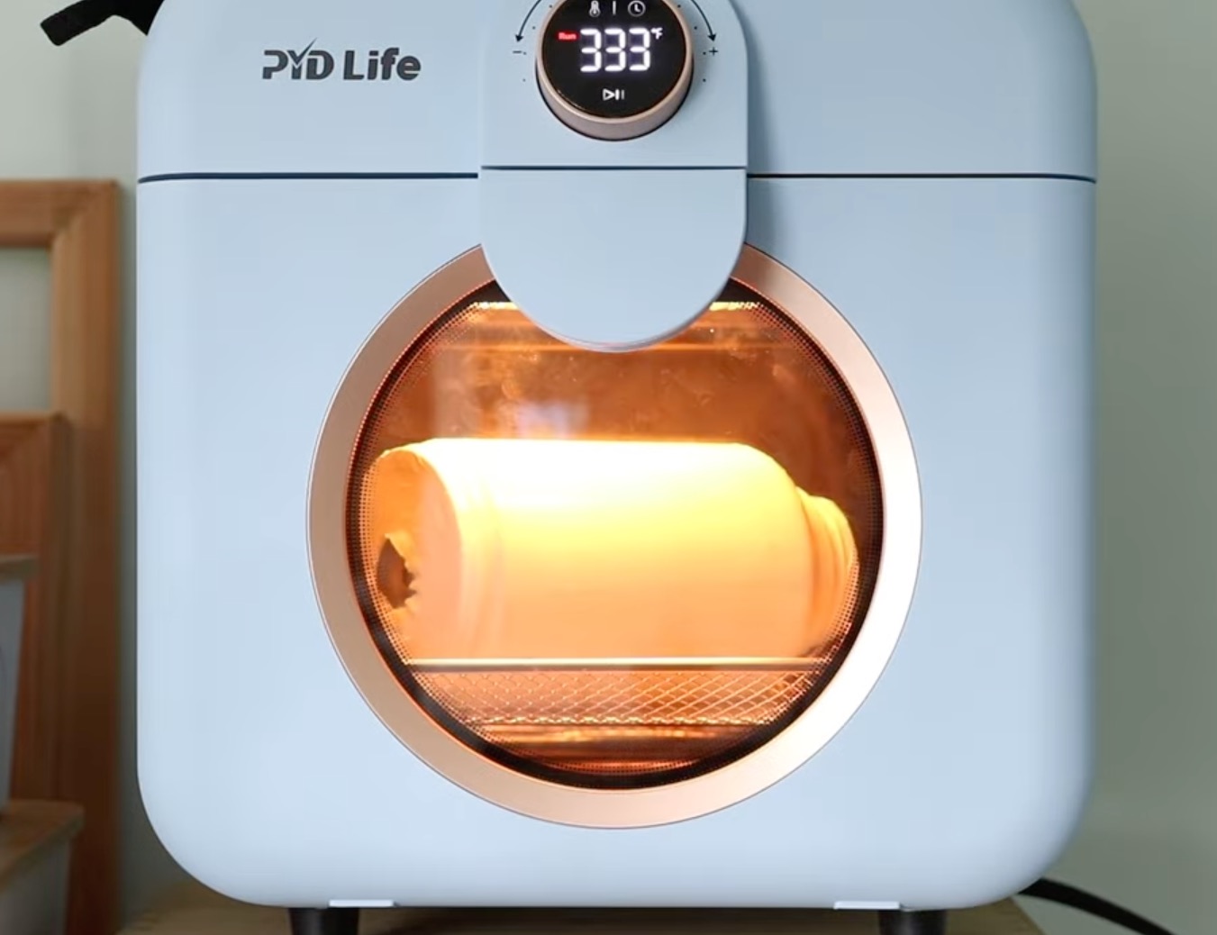 Sublimate the tumbler in a sublimation oven.