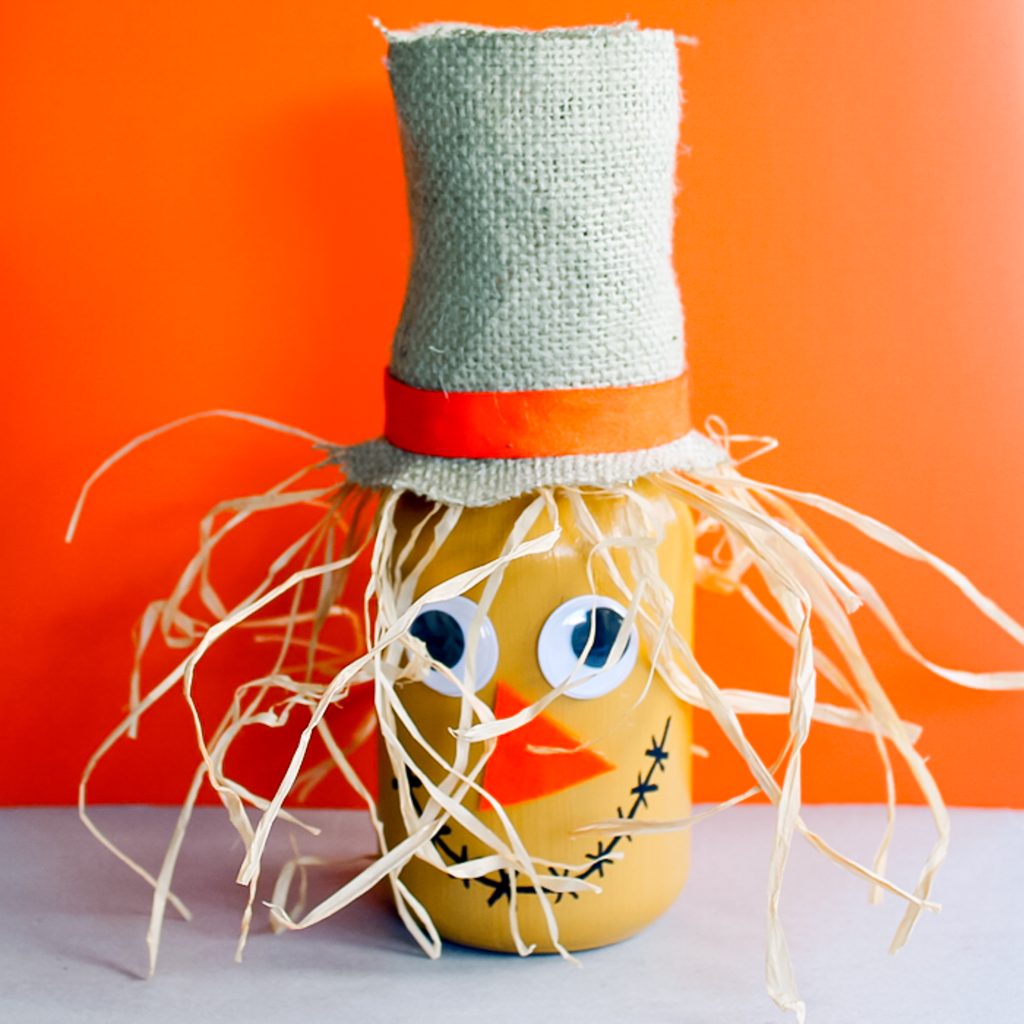 painted mason jar with raffia and burlap