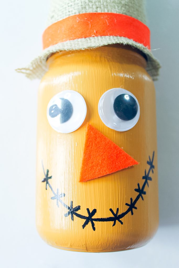 painted jar with embelishments