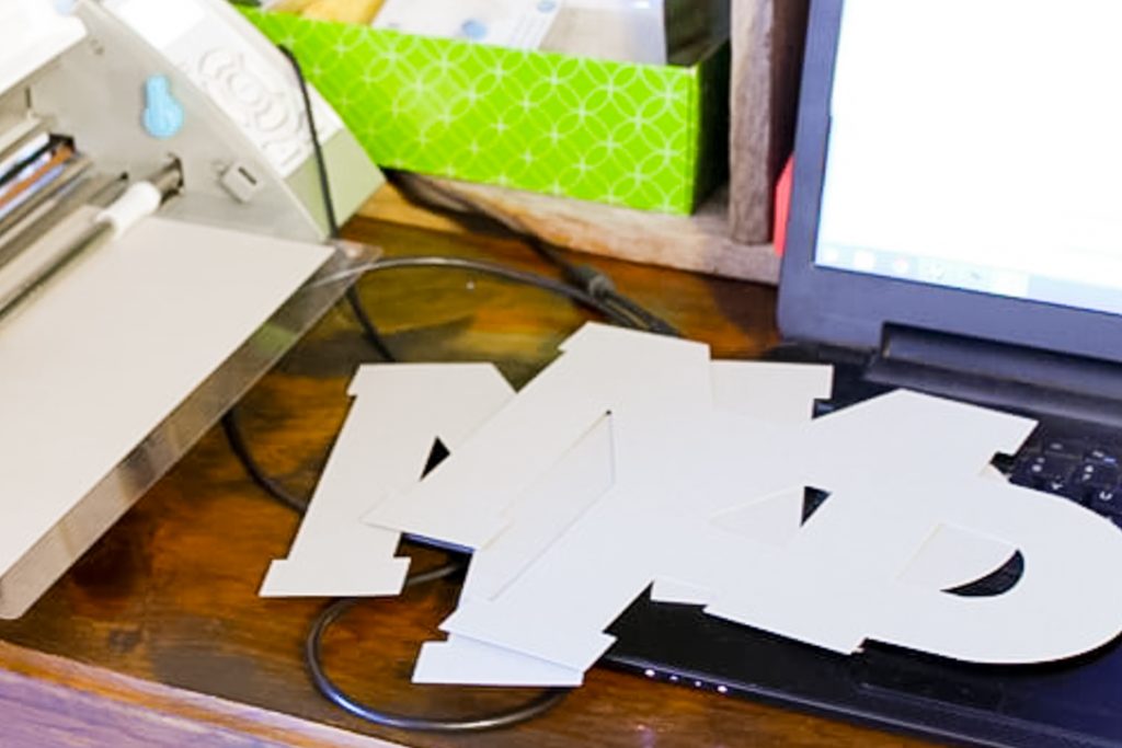 Chipboard letters cut with a Cricut machine