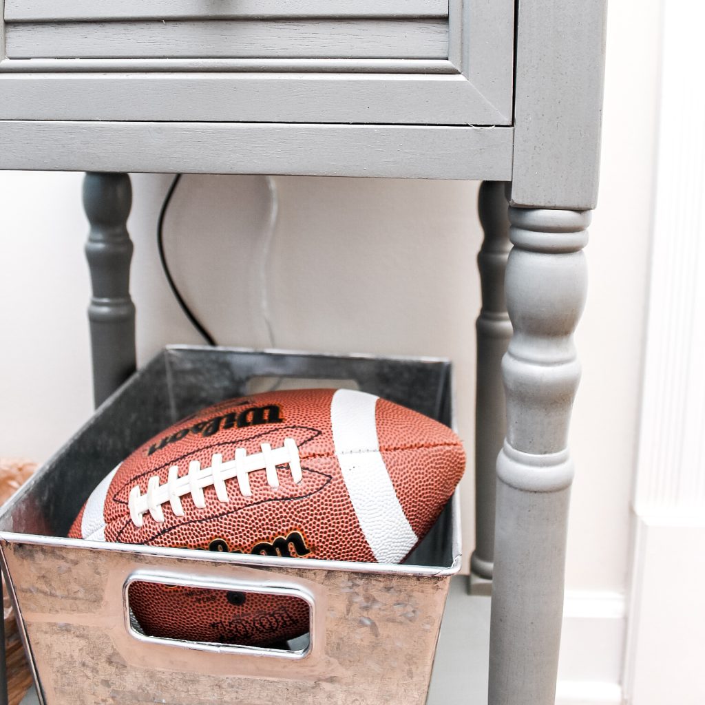 football in a galvanized bin
