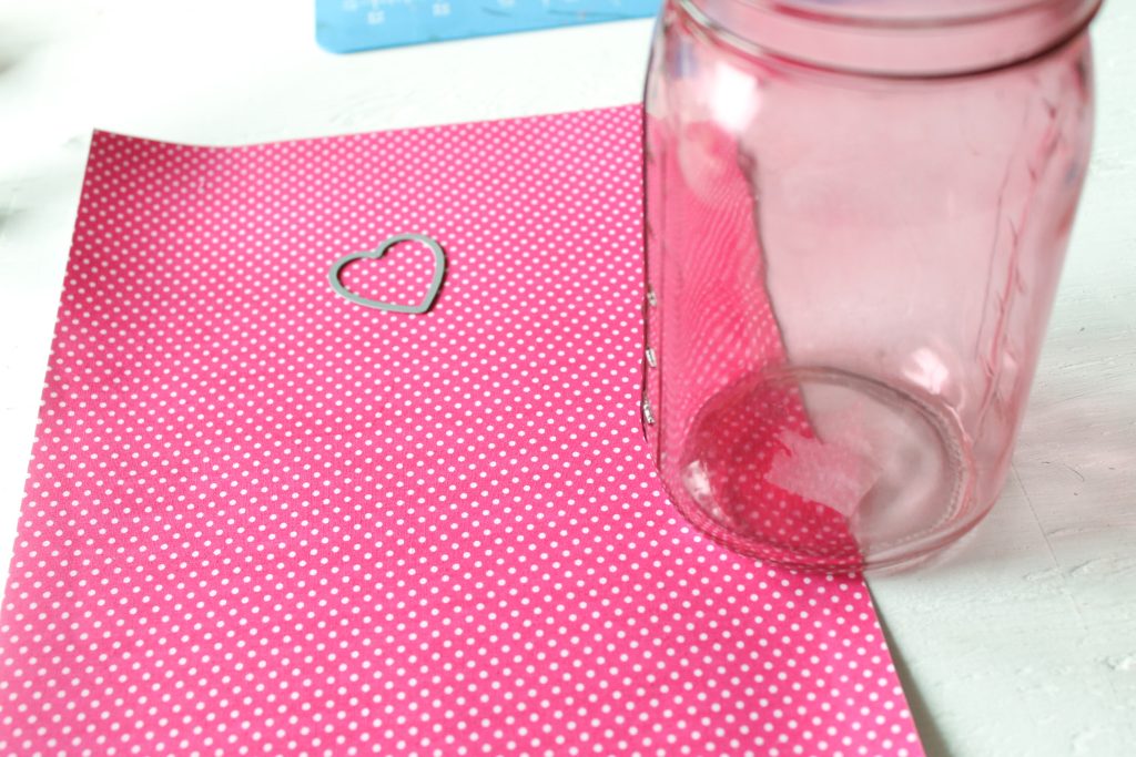 sheet of adhesive fabric with a di-cut heart