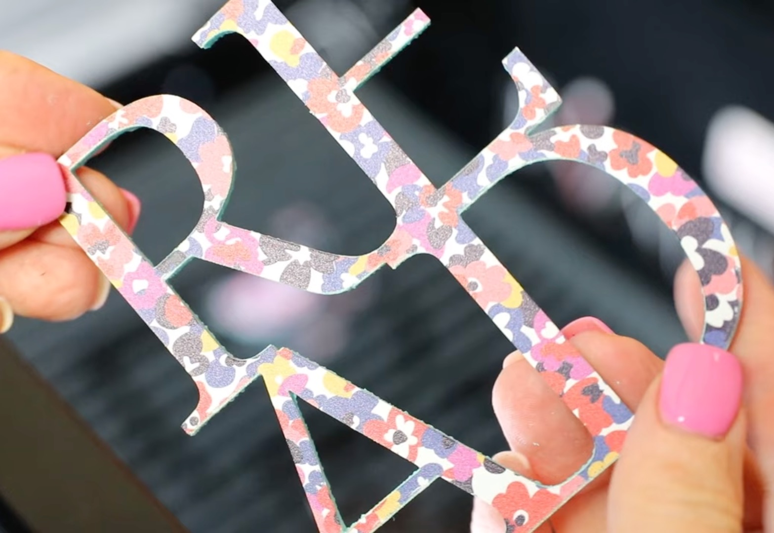 Cut out patterned acrylic.