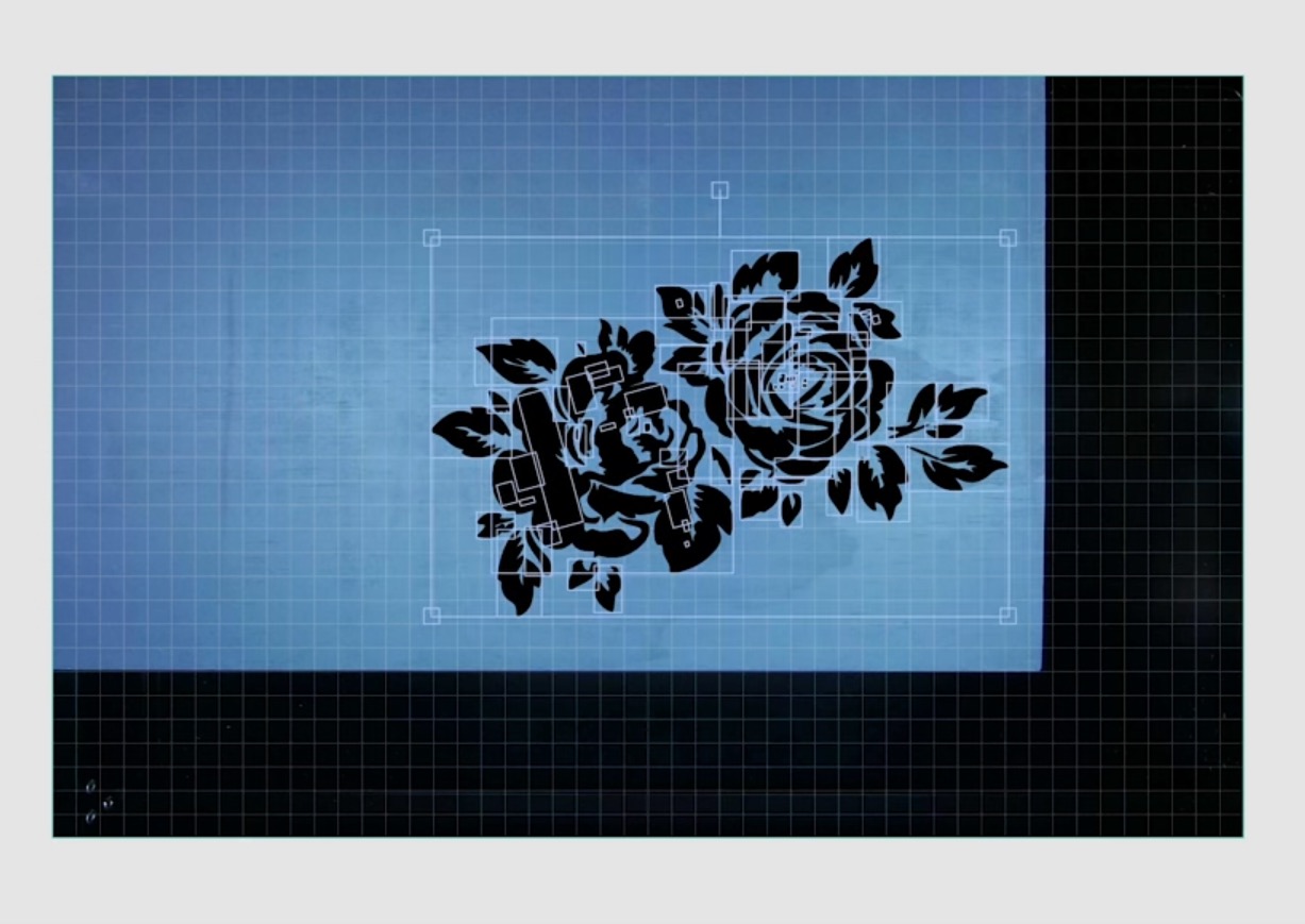 Add the design to the canvas and locate on the box.
