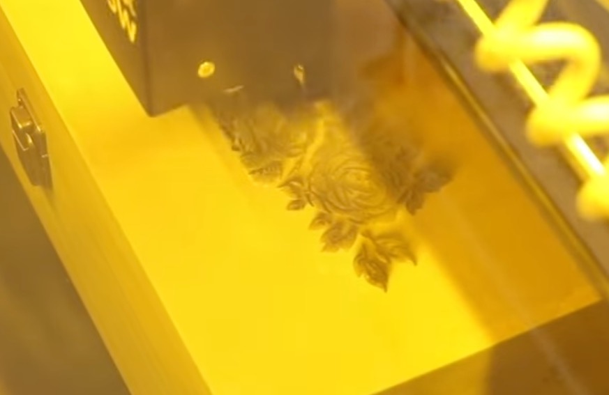 Engrave the top of the wood box.