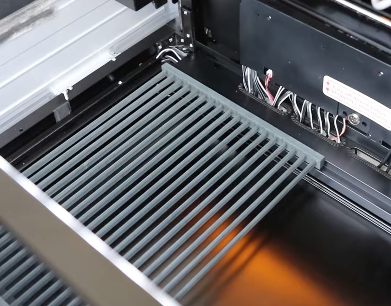 Add laser beds to the bottom of the tray.