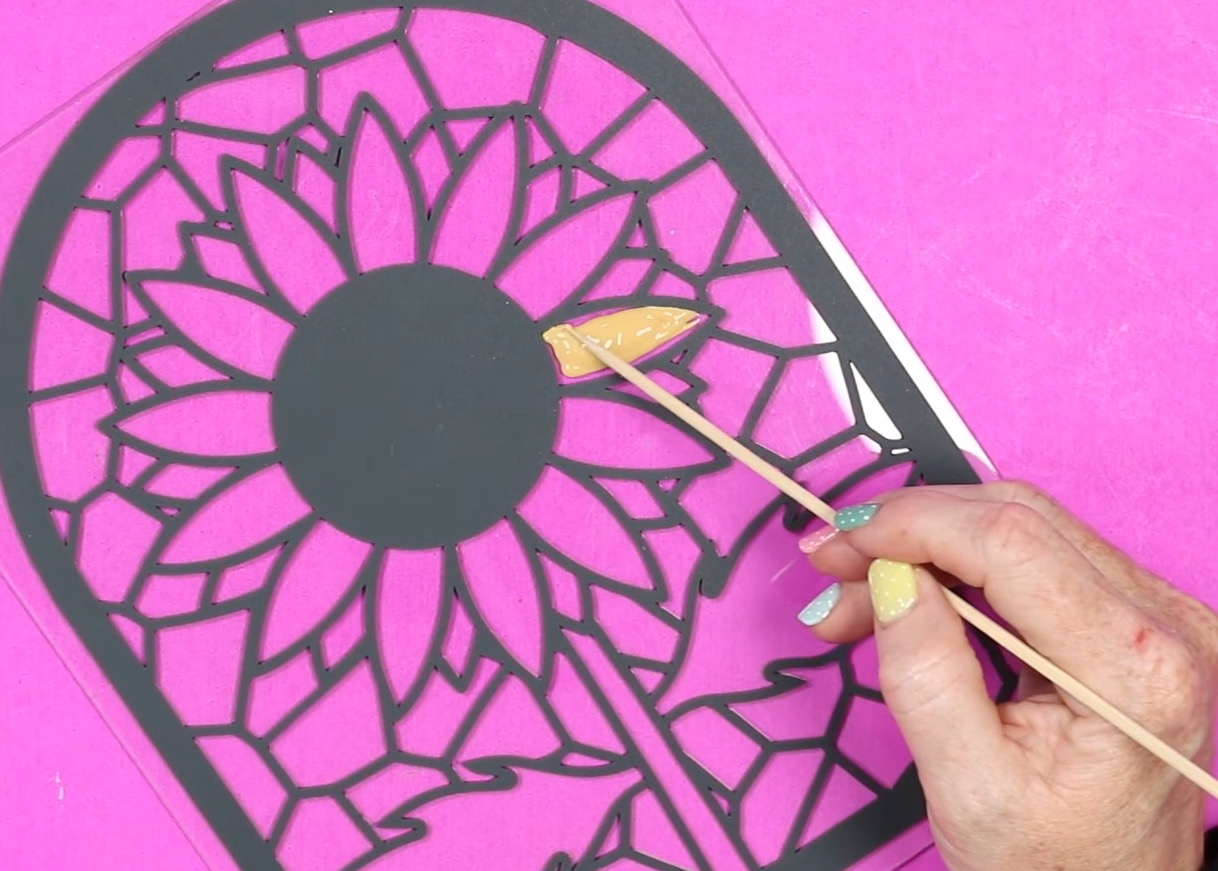 Use a toothpick of skewer to push the paint to the edge.