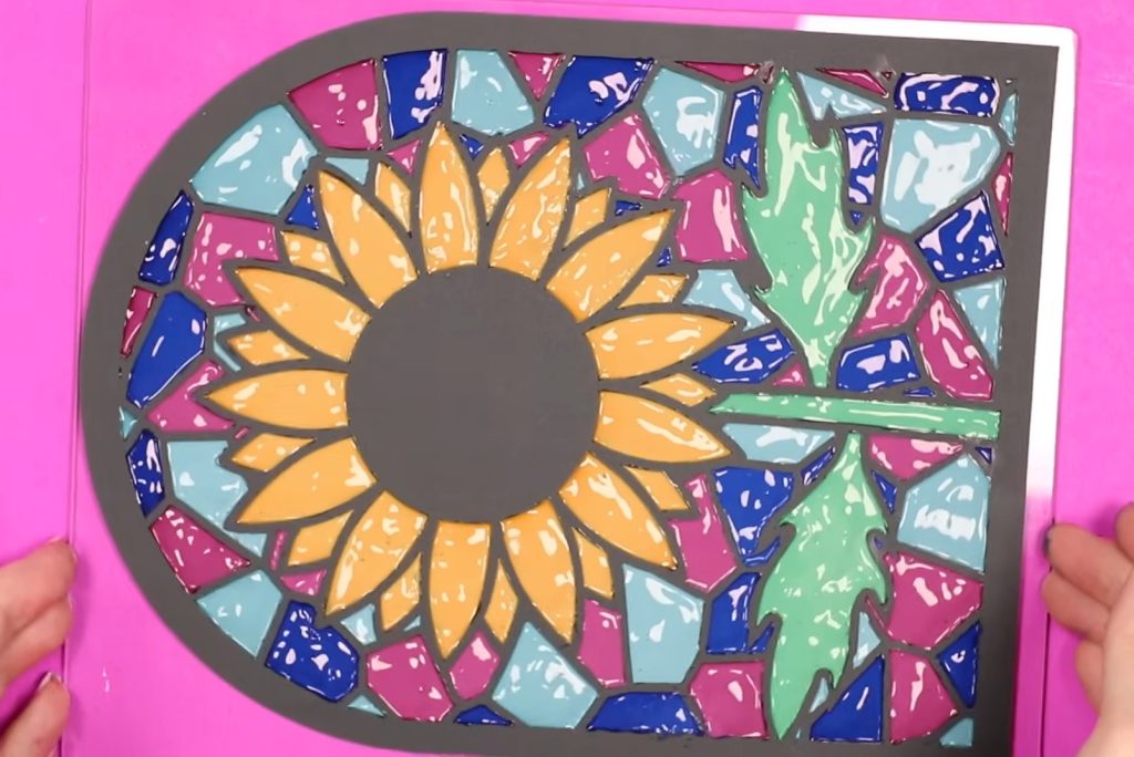 Back of the Cricut cut stained glass with wet paint.