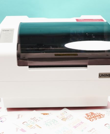 iColor 250 sticker printer with stickers.