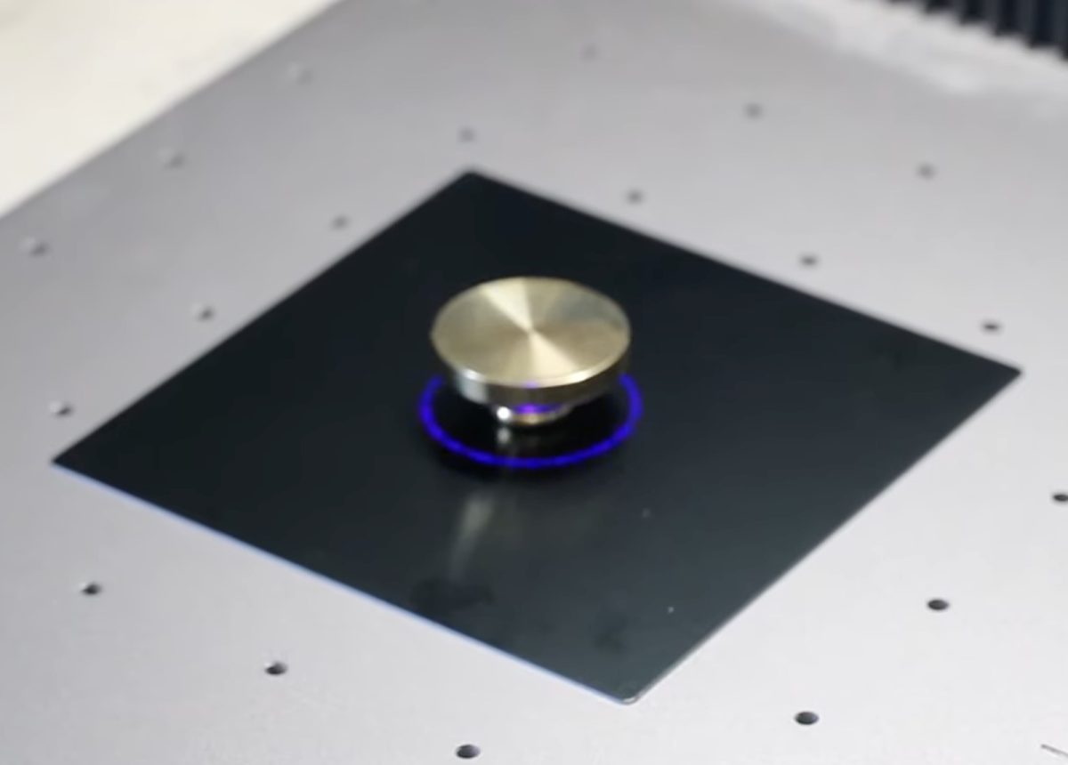 Frame the brass stamp in the laser.