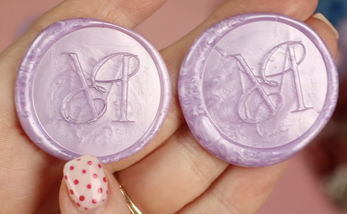 Comparing finished custom wax seals.