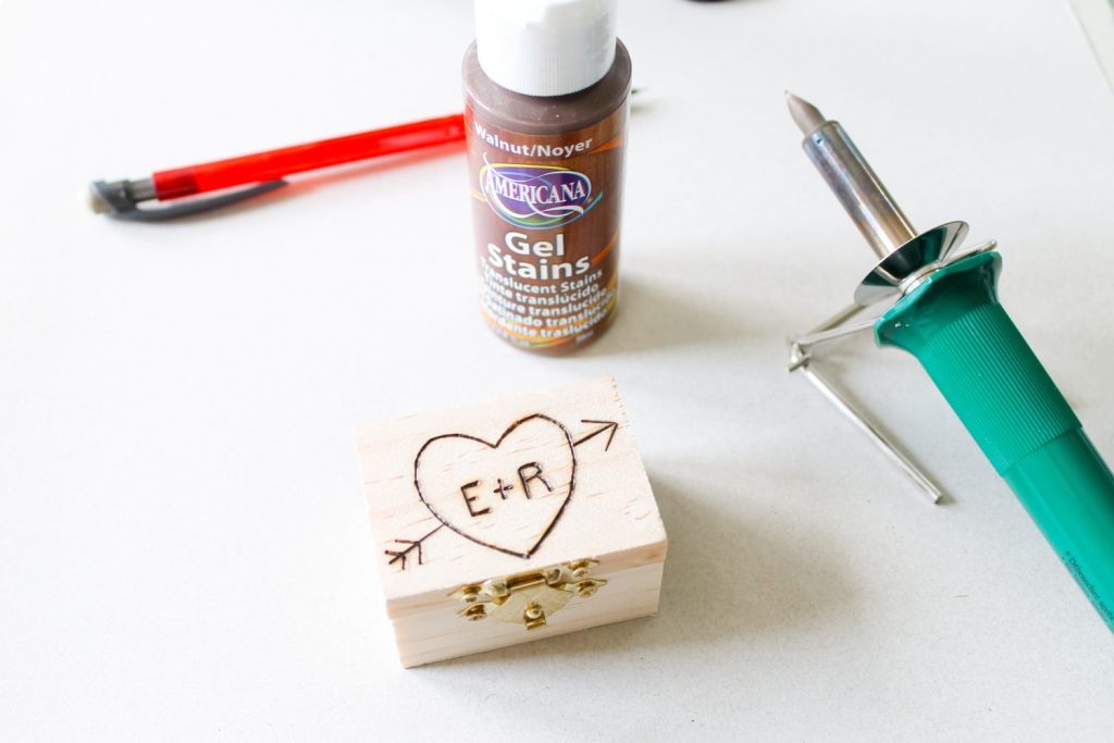 wood burning tool used on a wooden box