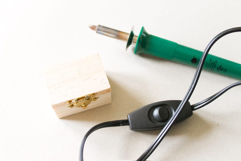 small wood box and wood burning tool