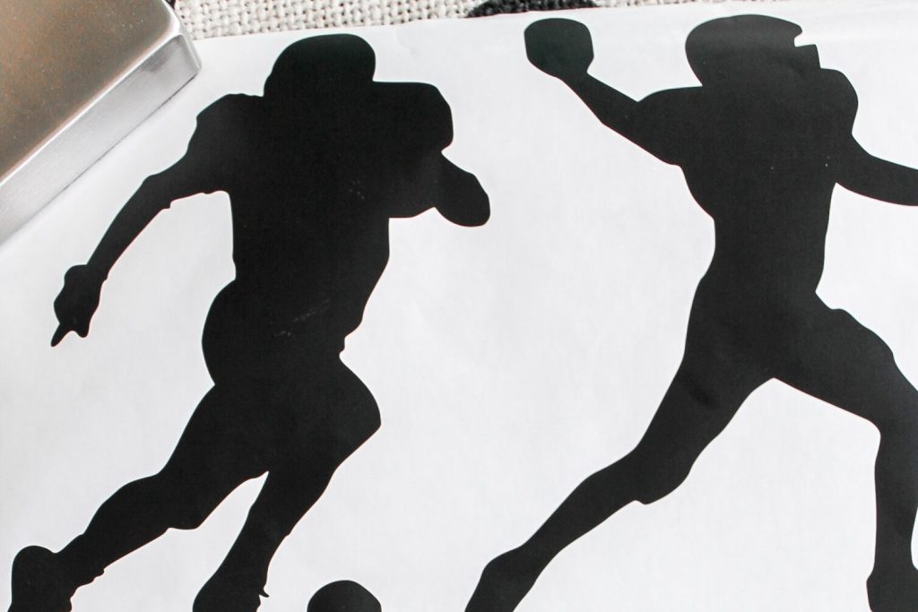 sports silhouettes cut from adhesive vinyl