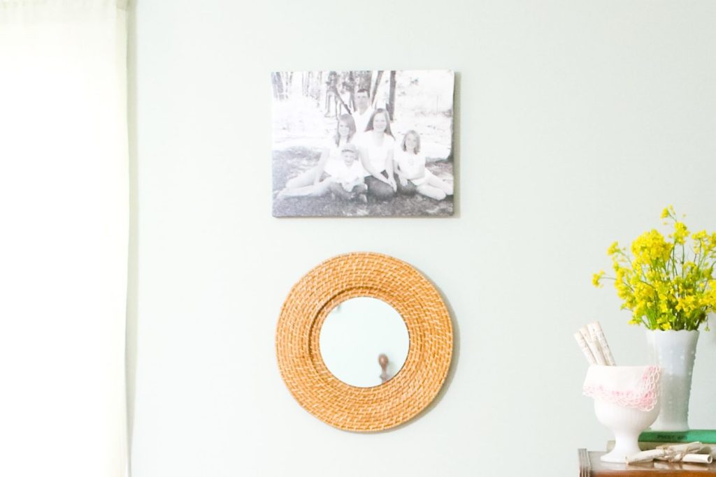 Woven Mirror Knock Off from a $1 Plate Charger at The Country Chic Cottage mirror hanging on the wall