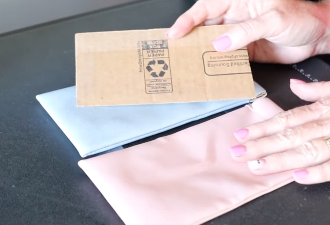 Add cardboard to the inside of the leather eyeglasses case.