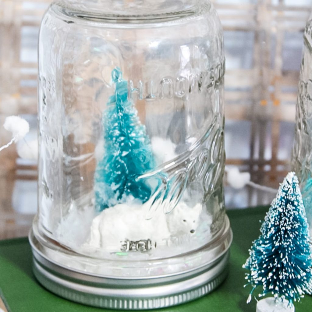 fox and tree with fake snow in a jar