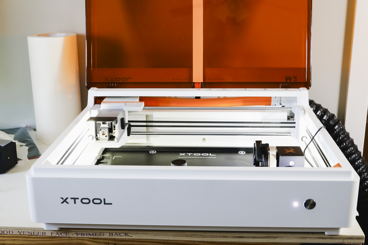 xTool M2 laser with the lid opened.
