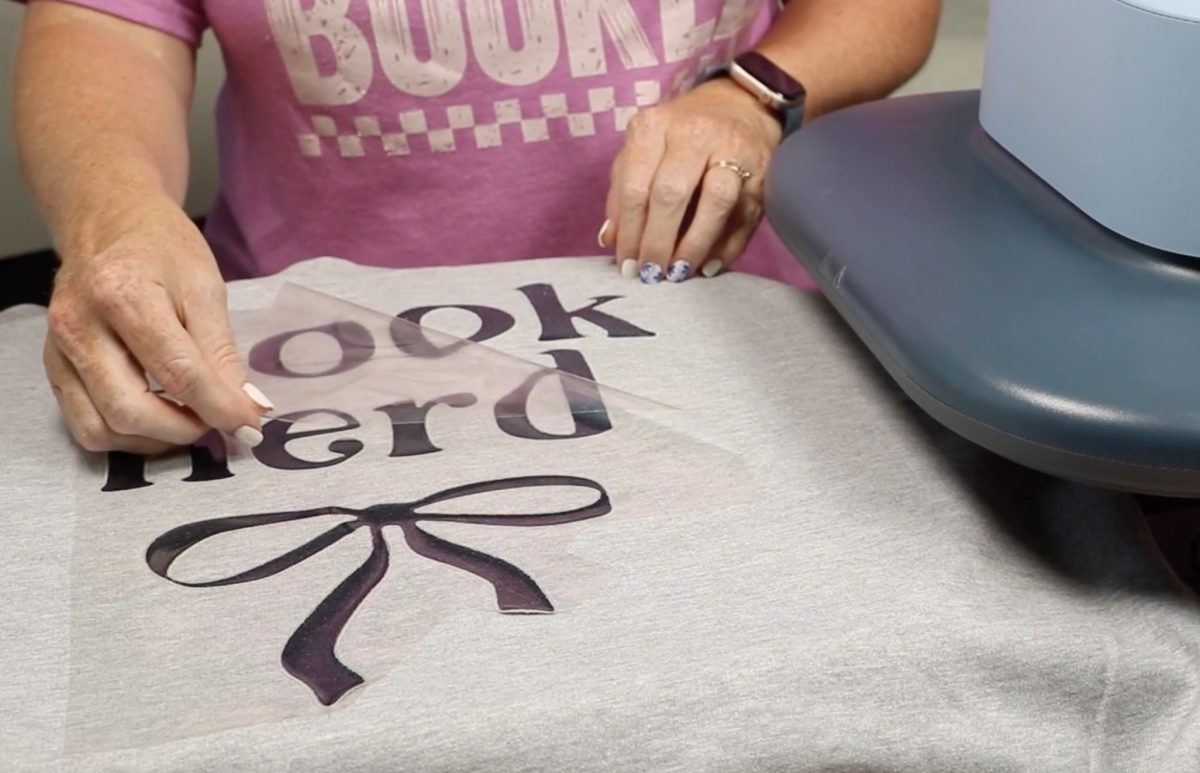 Peel back the carrier sheet.