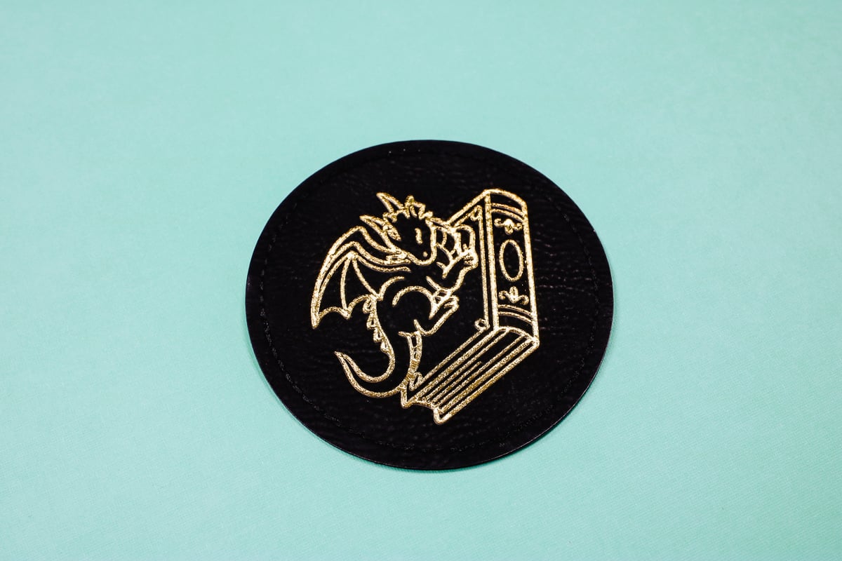 Finished gold foil leather patch.